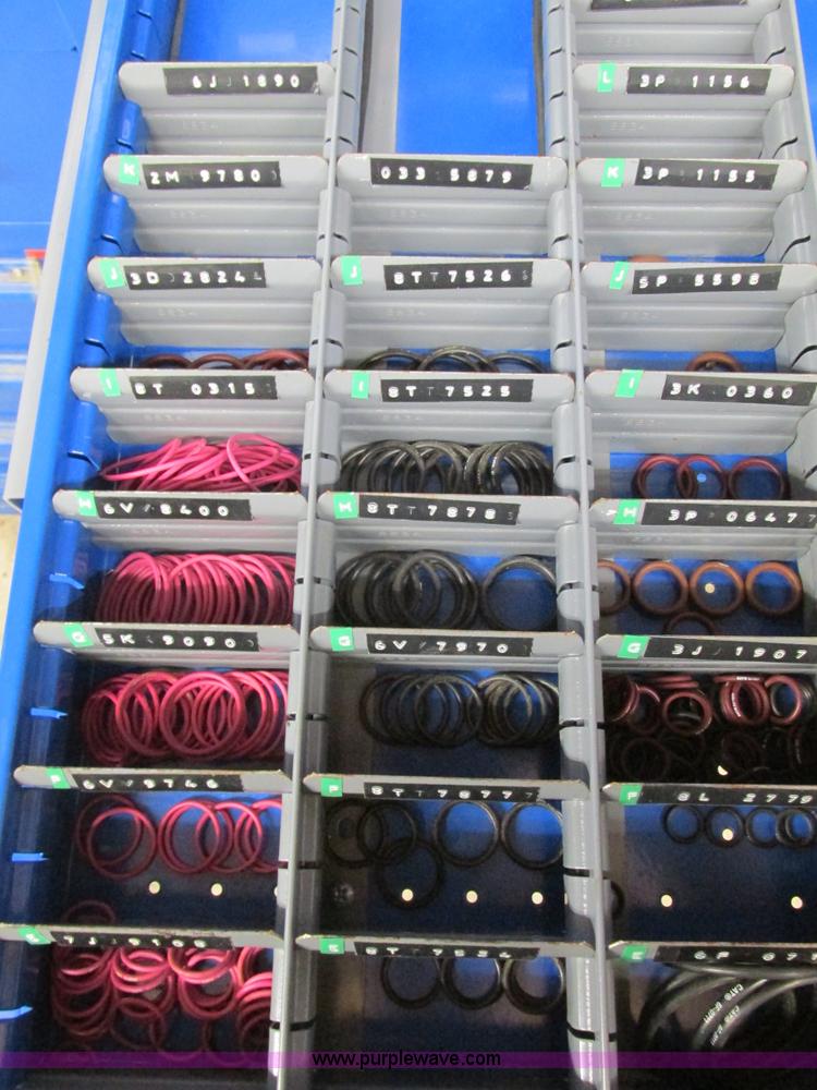 image for item V9962 Equipto parts bin and assorted Caterpillar parts