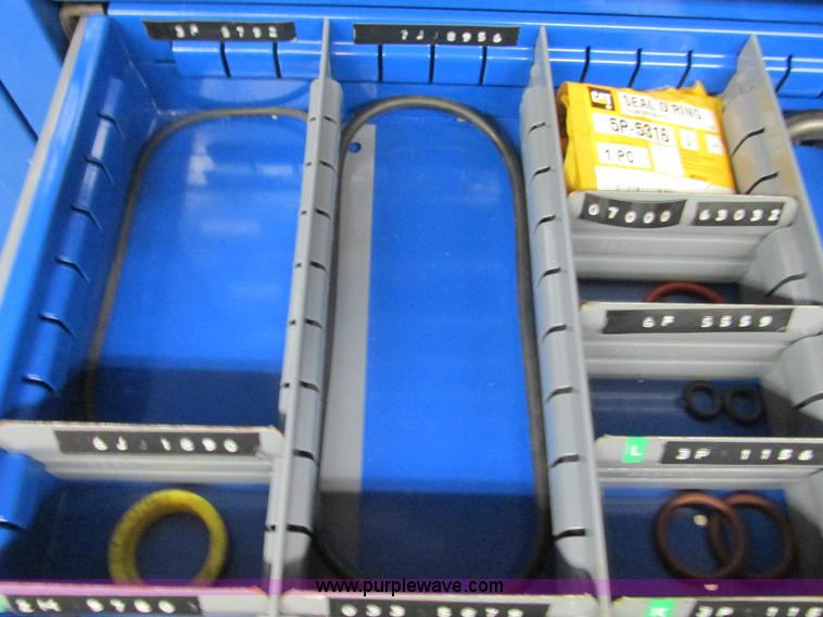 image for item V9962 Equipto parts bin and assorted Caterpillar parts