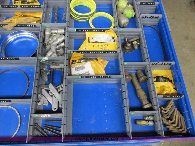 image for item V9962 Equipto parts bin and assorted Caterpillar parts