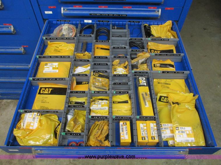 image for item V9962 Equipto parts bin and assorted Caterpillar parts