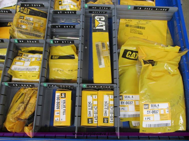 image for item V9962 Equipto parts bin and assorted Caterpillar parts
