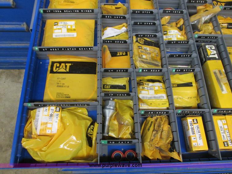 image for item V9962 Equipto parts bin and assorted Caterpillar parts
