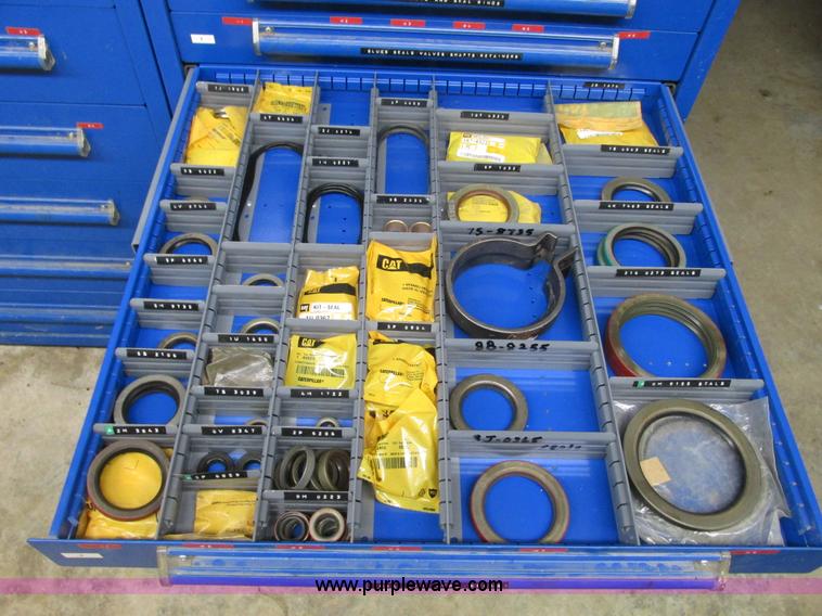 image for item V9962 Equipto parts bin and assorted Caterpillar parts