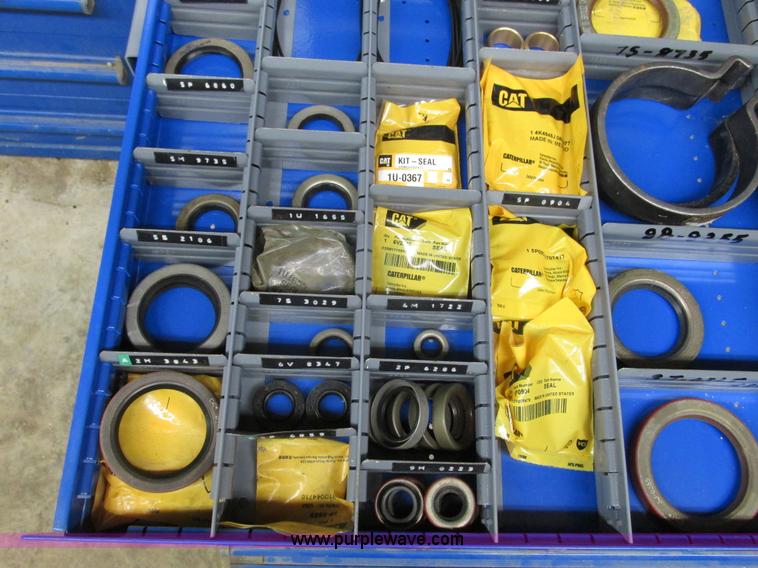 image for item V9962 Equipto parts bin and assorted Caterpillar parts