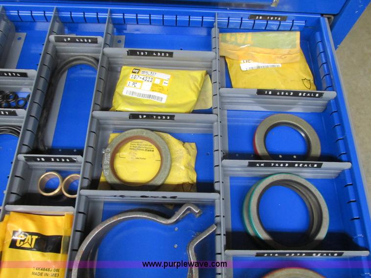 image for item V9962 Equipto parts bin and assorted Caterpillar parts