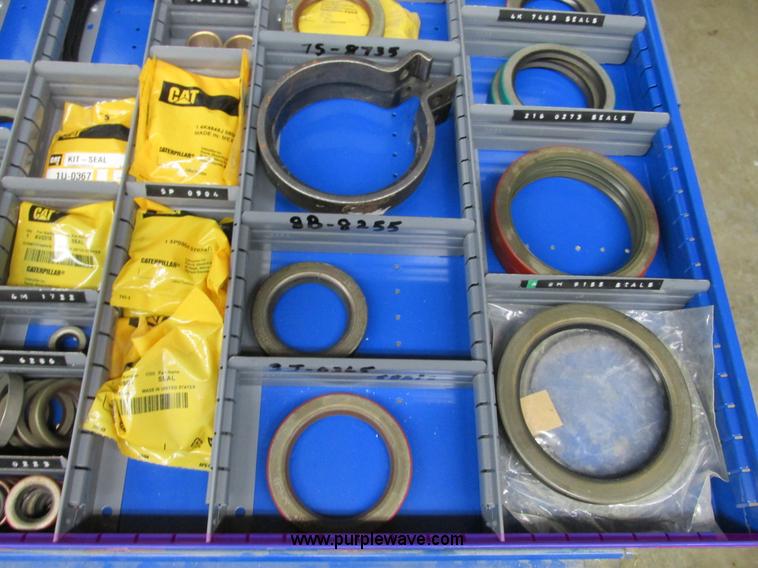 image for item V9962 Equipto parts bin and assorted Caterpillar parts