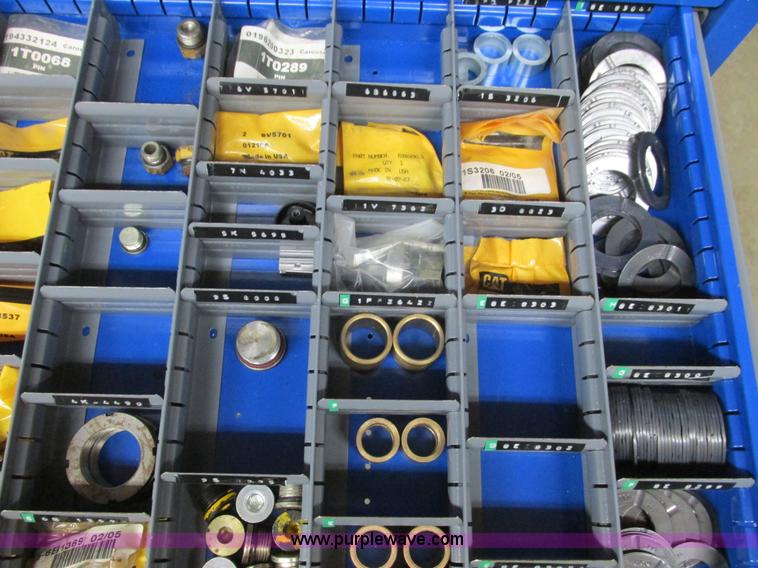 image for item V9962 Equipto parts bin and assorted Caterpillar parts