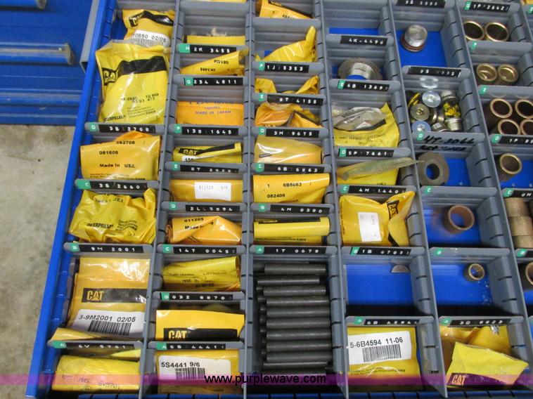 image for item V9962 Equipto parts bin and assorted Caterpillar parts