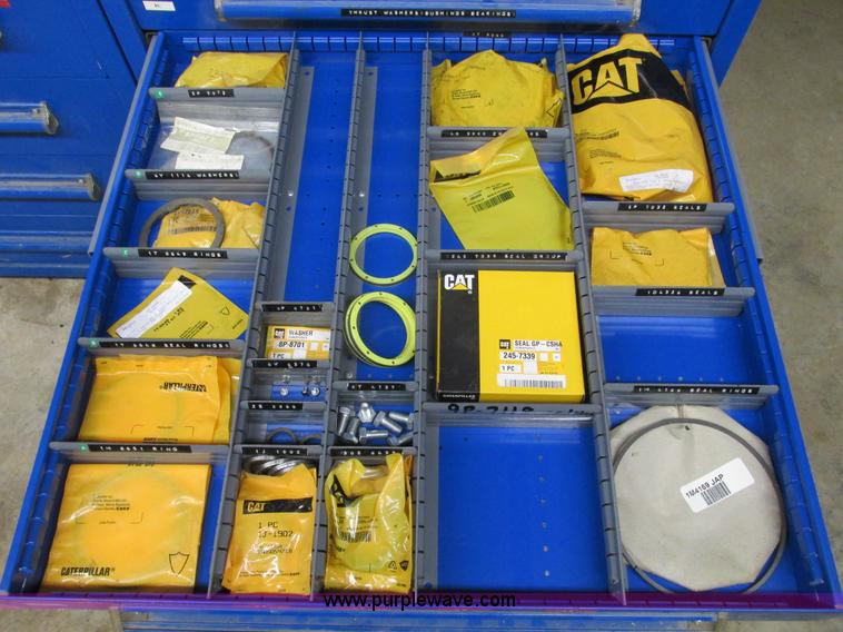 image for item V9962 Equipto parts bin and assorted Caterpillar parts