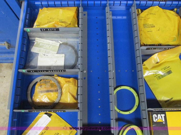 image for item V9962 Equipto parts bin and assorted Caterpillar parts
