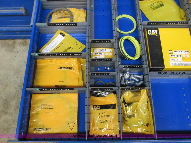 image for item V9962 Equipto parts bin and assorted Caterpillar parts