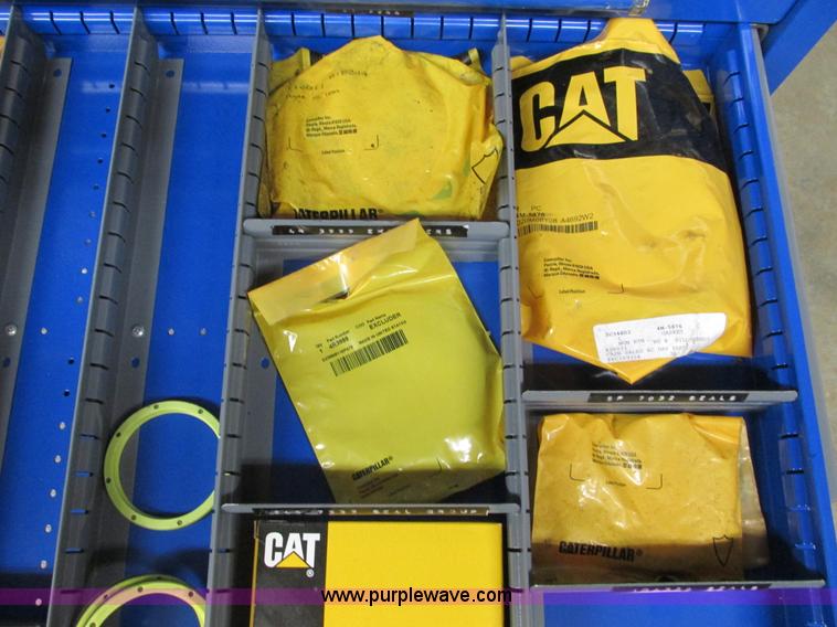 image for item V9962 Equipto parts bin and assorted Caterpillar parts