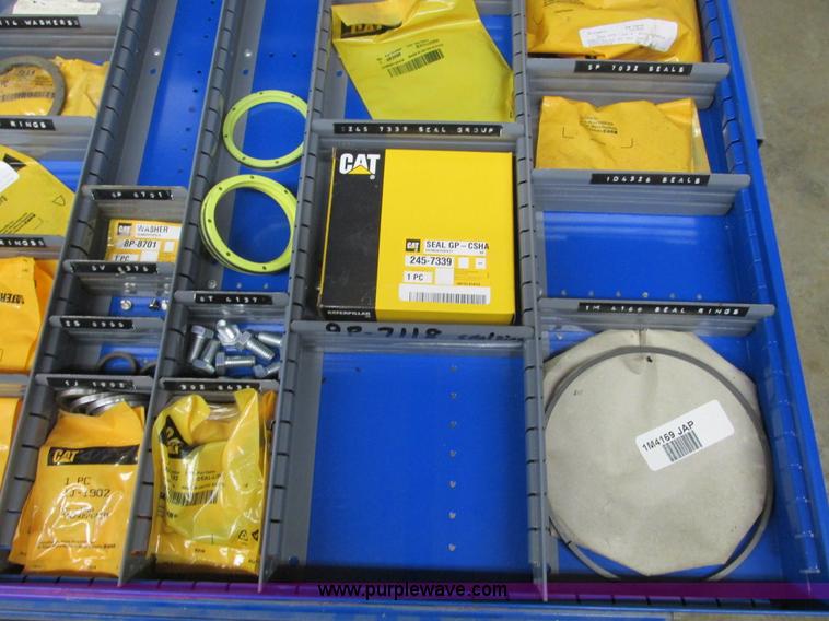 image for item V9962 Equipto parts bin and assorted Caterpillar parts