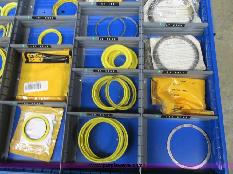 image for item V9962 Equipto parts bin and assorted Caterpillar parts