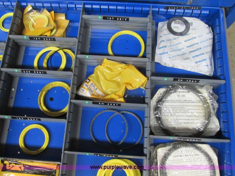 image for item V9962 Equipto parts bin and assorted Caterpillar parts