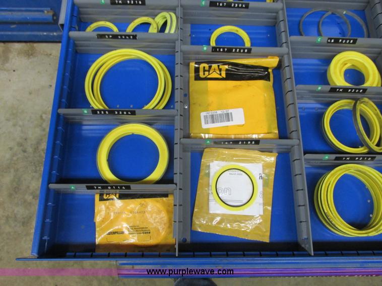 image for item V9962 Equipto parts bin and assorted Caterpillar parts