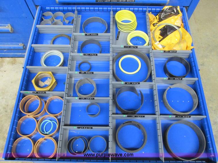 image for item V9962 Equipto parts bin and assorted Caterpillar parts