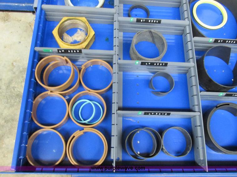 image for item V9962 Equipto parts bin and assorted Caterpillar parts