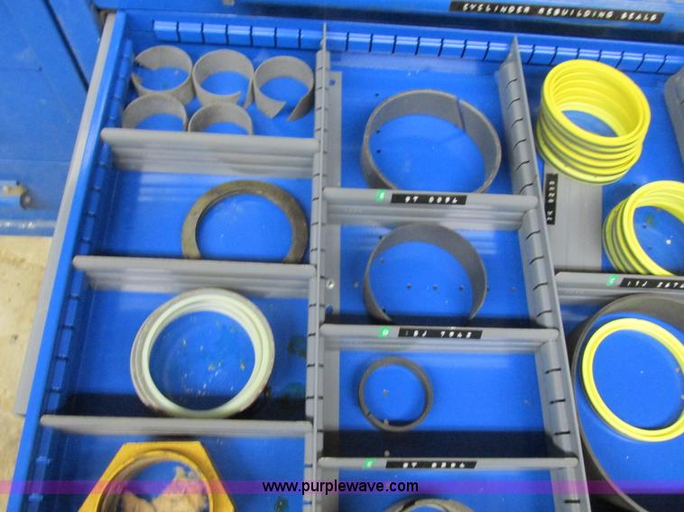 image for item V9962 Equipto parts bin and assorted Caterpillar parts