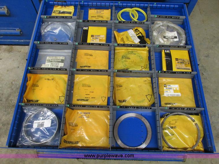 image for item V9962 Equipto parts bin and assorted Caterpillar parts