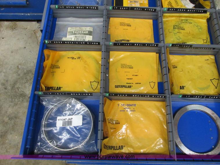 image for item V9962 Equipto parts bin and assorted Caterpillar parts