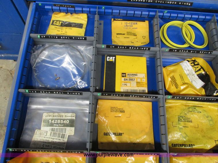 image for item V9962 Equipto parts bin and assorted Caterpillar parts