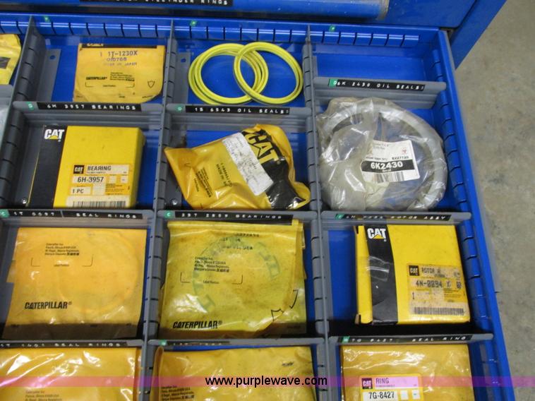 image for item V9962 Equipto parts bin and assorted Caterpillar parts