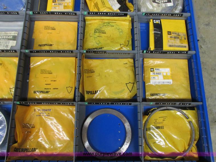 image for item V9962 Equipto parts bin and assorted Caterpillar parts