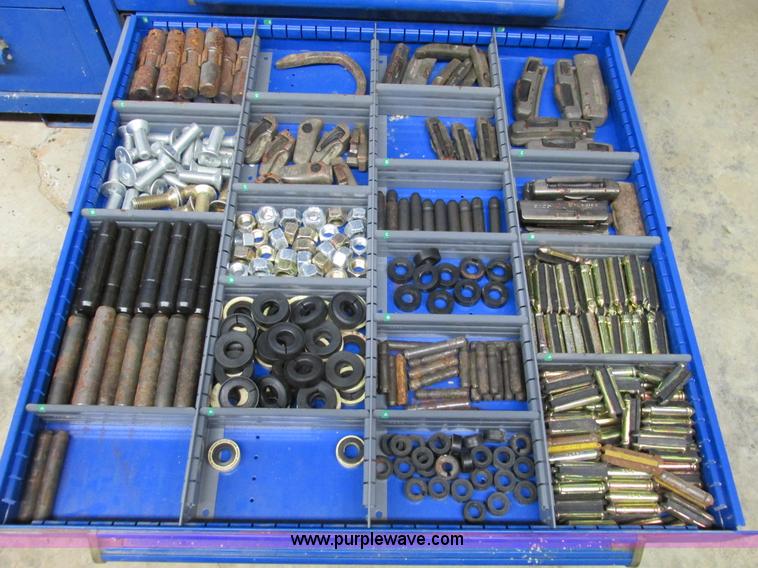 image for item V9962 Equipto parts bin and assorted Caterpillar parts
