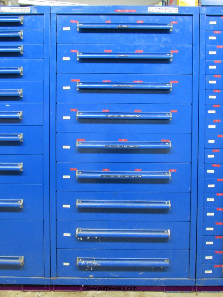 image for item V9963 Equipto parts bin and assorted Caterpillar parts