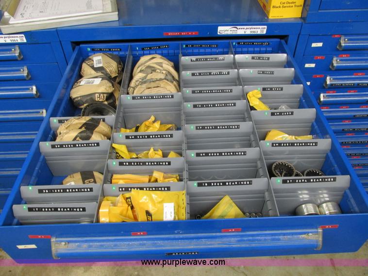 image for item V9963 Equipto parts bin and assorted Caterpillar parts