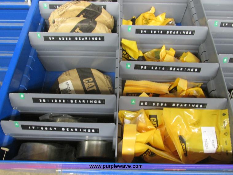 image for item V9963 Equipto parts bin and assorted Caterpillar parts