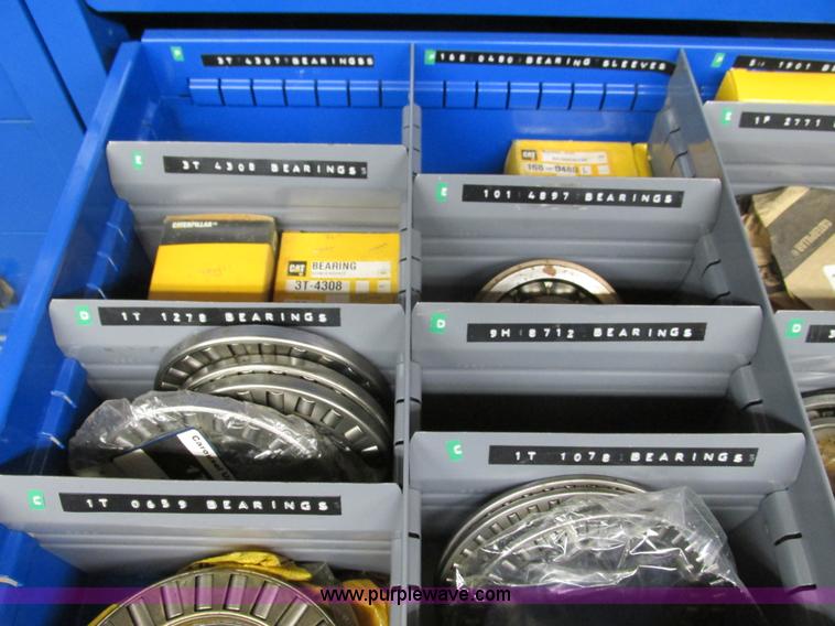 image for item V9963 Equipto parts bin and assorted Caterpillar parts