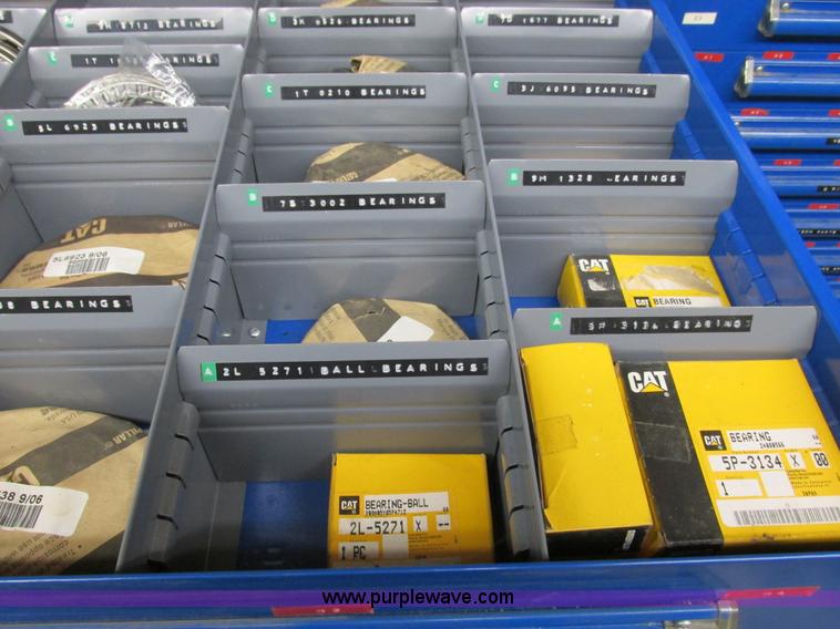 image for item V9963 Equipto parts bin and assorted Caterpillar parts