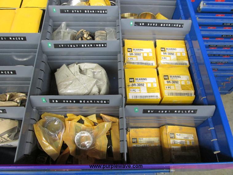 image for item V9963 Equipto parts bin and assorted Caterpillar parts