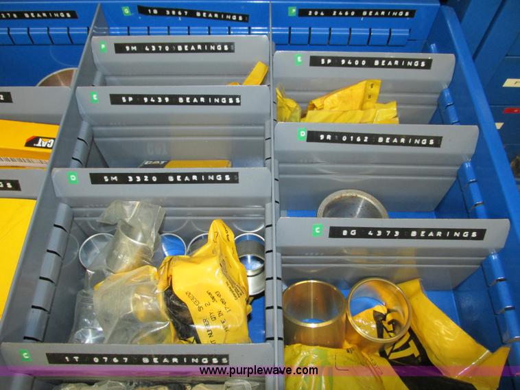 image for item V9963 Equipto parts bin and assorted Caterpillar parts