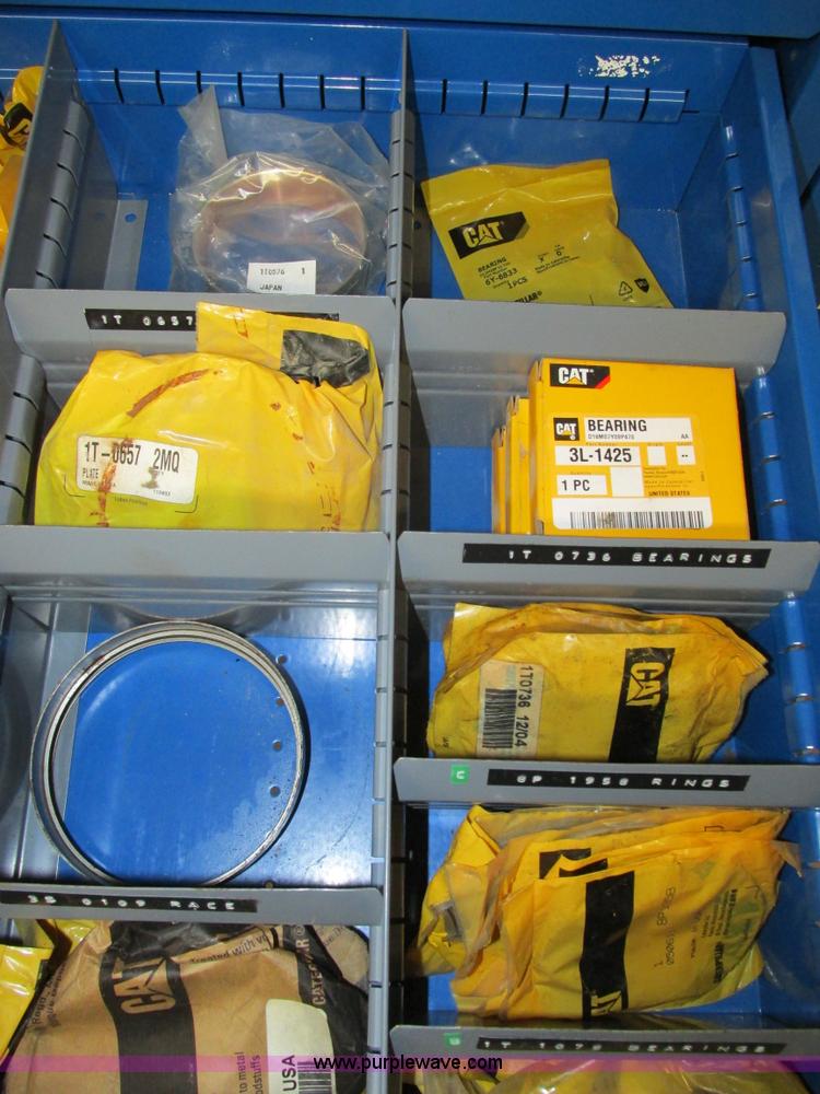 image for item V9963 Equipto parts bin and assorted Caterpillar parts