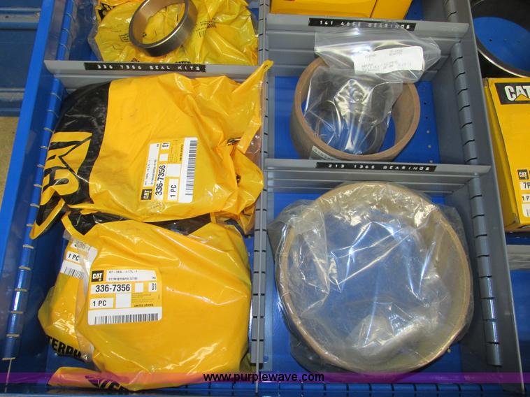 image for item V9963 Equipto parts bin and assorted Caterpillar parts