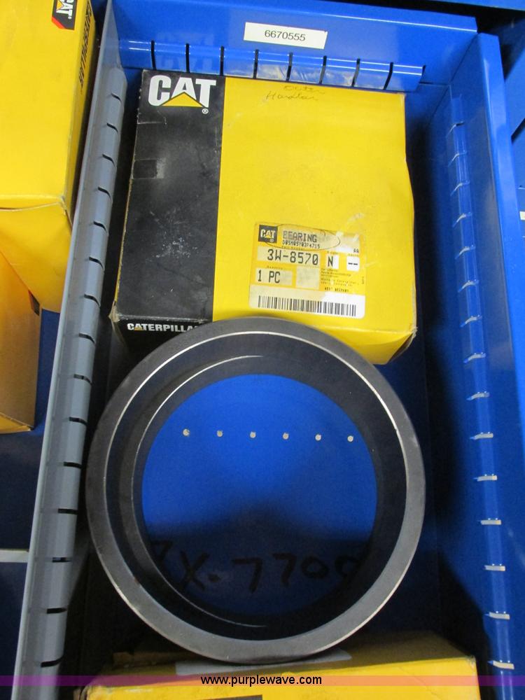 image for item V9963 Equipto parts bin and assorted Caterpillar parts