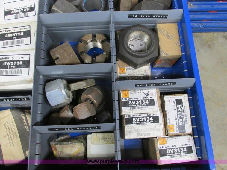 image for item V9963 Equipto parts bin and assorted Caterpillar parts