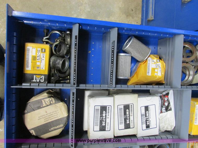 image for item V9963 Equipto parts bin and assorted Caterpillar parts