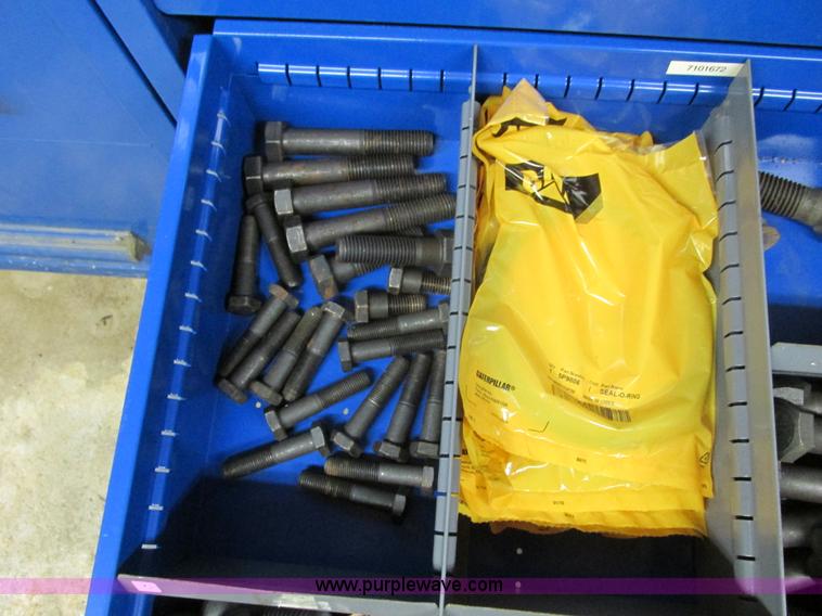 image for item V9963 Equipto parts bin and assorted Caterpillar parts