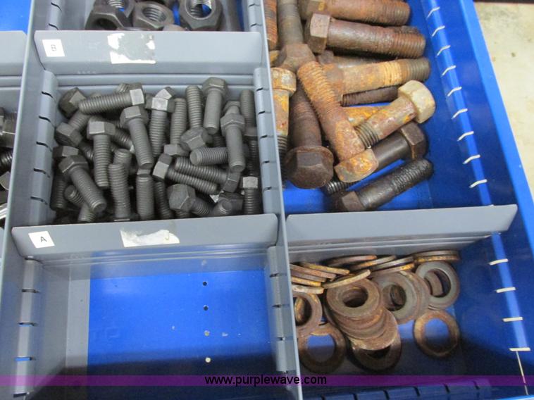 image for item V9963 Equipto parts bin and assorted Caterpillar parts