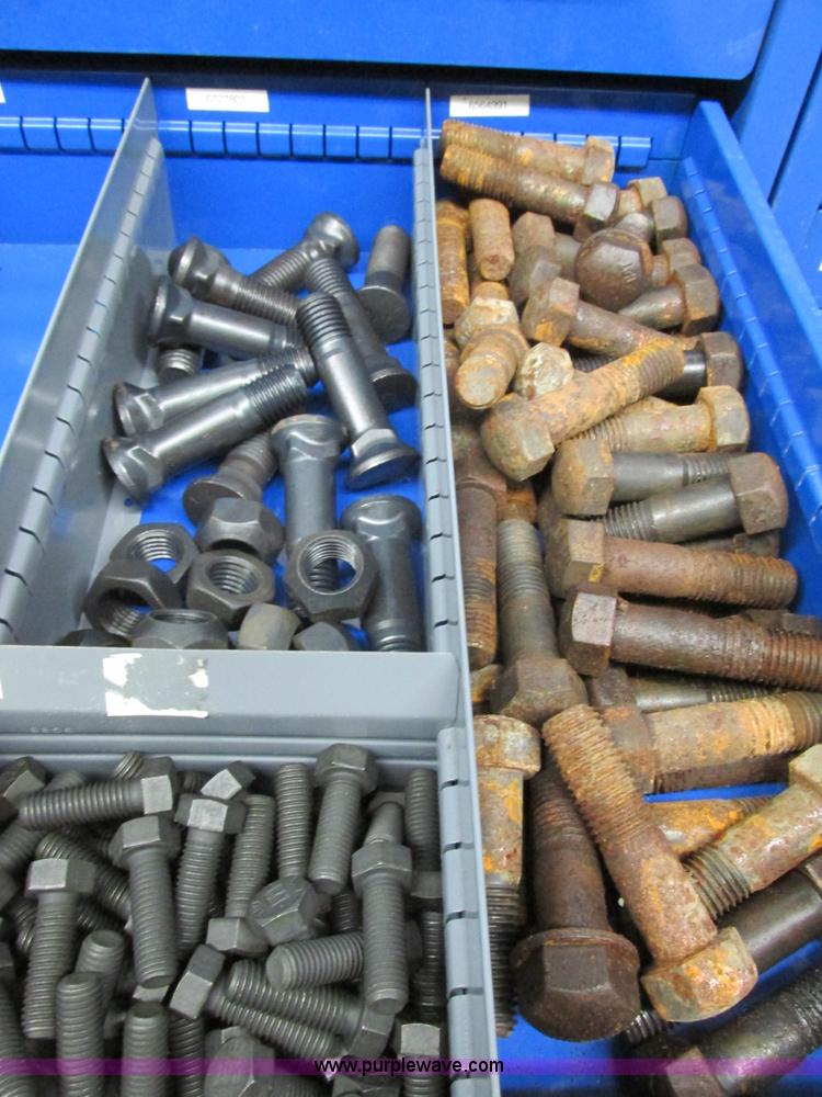 image for item V9963 Equipto parts bin and assorted Caterpillar parts