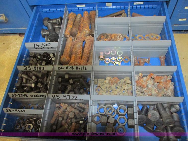 image for item V9963 Equipto parts bin and assorted Caterpillar parts