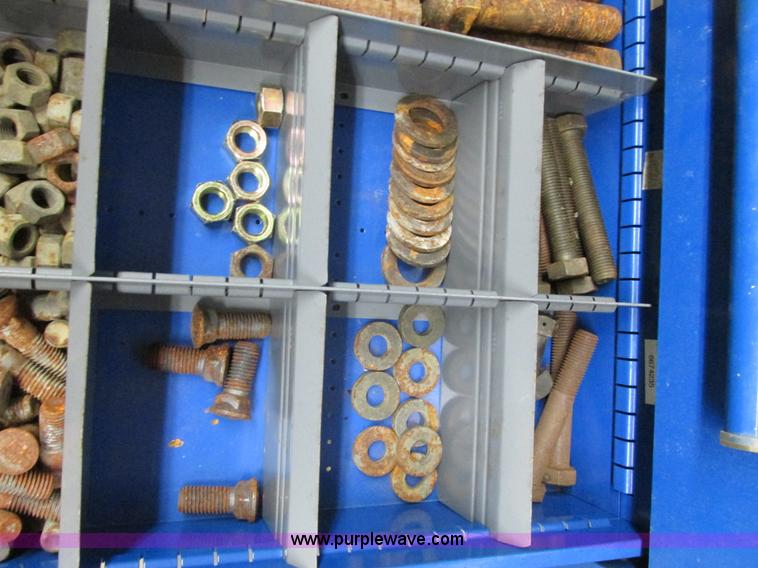 image for item V9963 Equipto parts bin and assorted Caterpillar parts