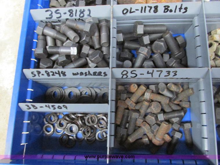 image for item V9963 Equipto parts bin and assorted Caterpillar parts