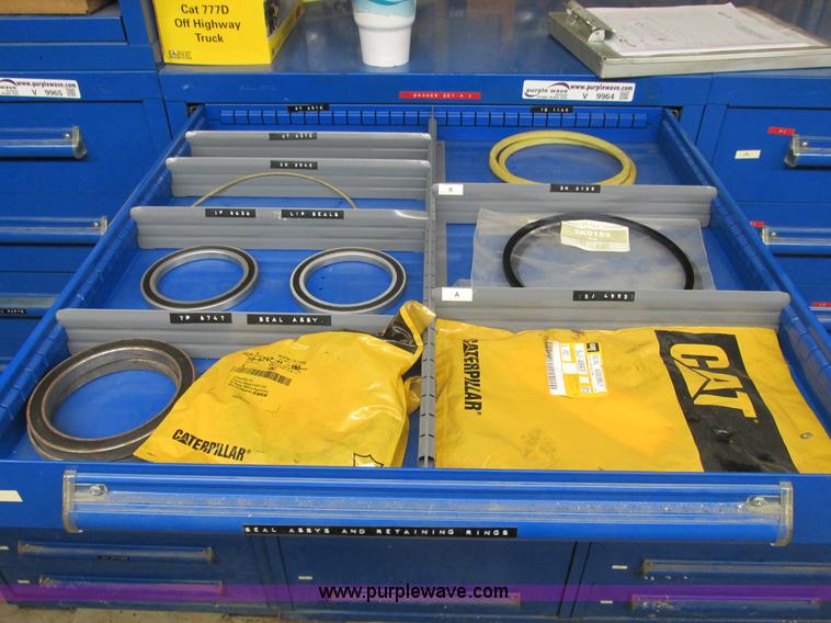 image for item V9964 Equipto parts bin and assorted Caterpillar parts