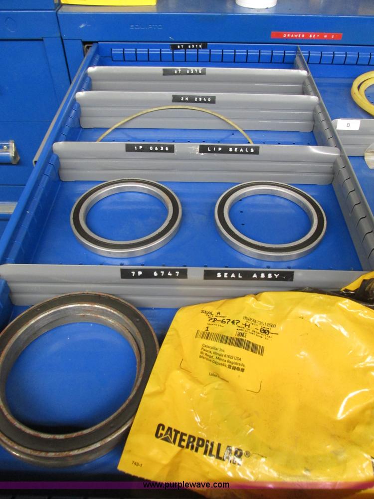 image for item V9964 Equipto parts bin and assorted Caterpillar parts