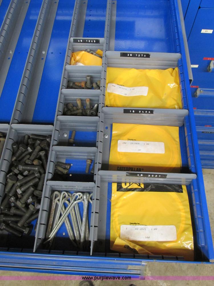 image for item V9964 Equipto parts bin and assorted Caterpillar parts